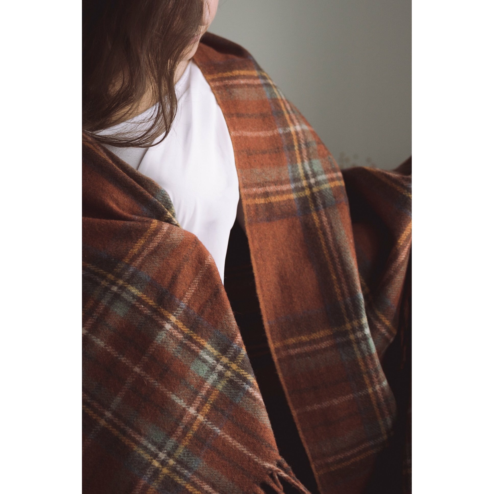 Deep Red Plaid Blanket made from recycled wool and recycled fibres. Eco-friendly wool blanket that is machine washable. Tartan Blanket Co. Festive Plaid Blanket. Stewart Royal Antique Tartan.
