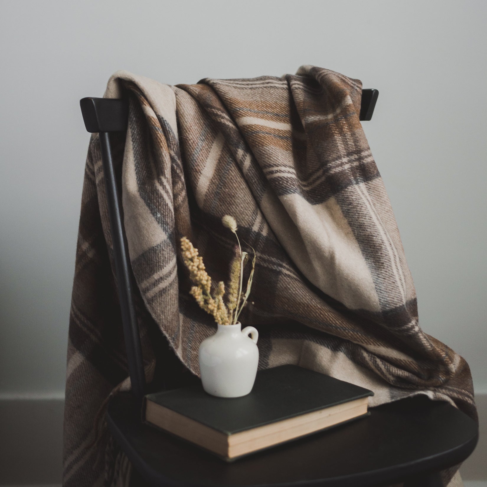Brown Plaid Blanket made from recycled wool and recycled fibres. Eco-friendly wool blanket that is machine washable. Tartan Blanket Co. Neutral Plaid Blanket. Stewart Natural Dress Tartan