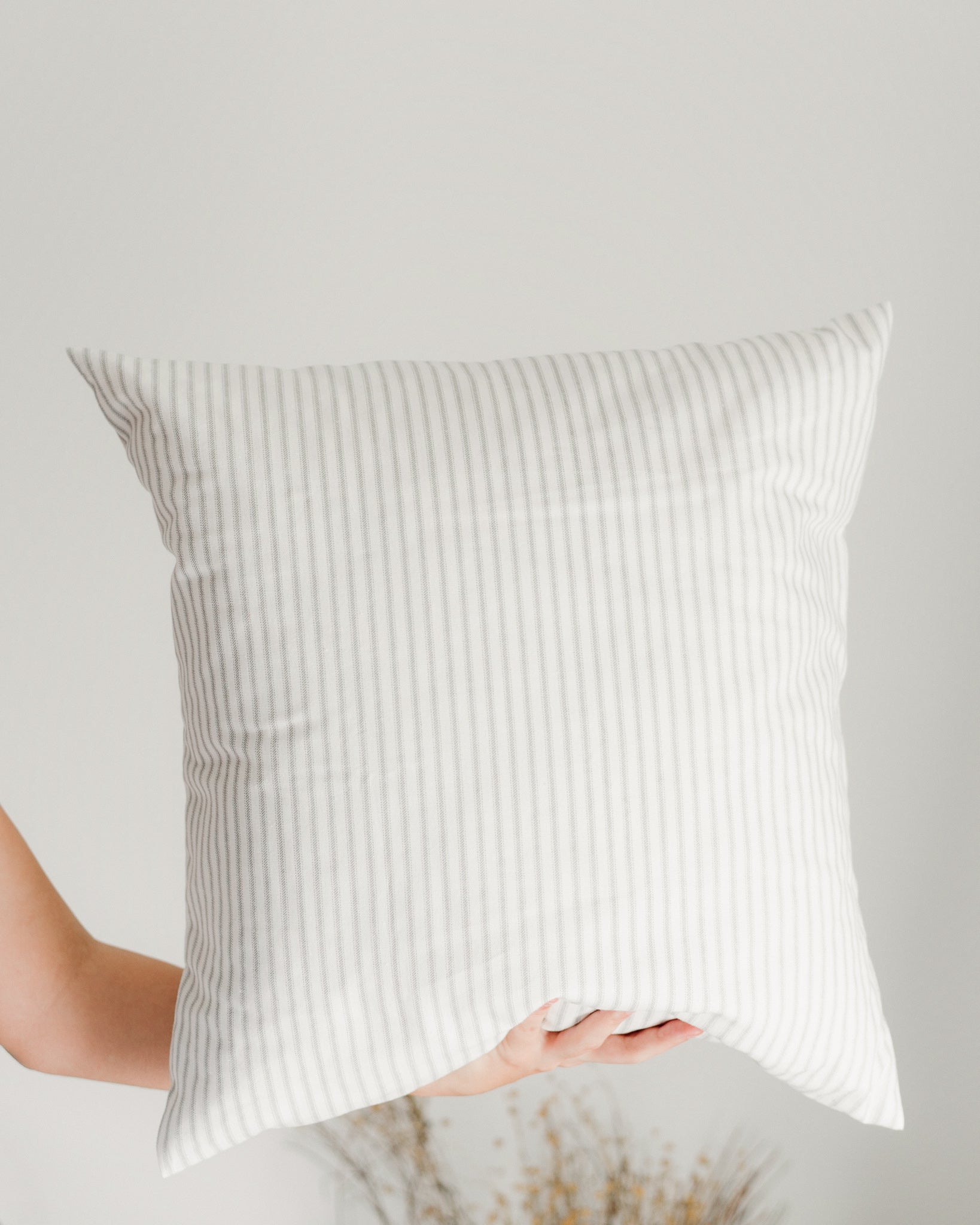 Ticking stripe cushion cover in a light charcoal colour against a soft white. Farmhouse Cushion Cover. Farmhouse pillow. Accent pillow. ticking stripe pillow. 