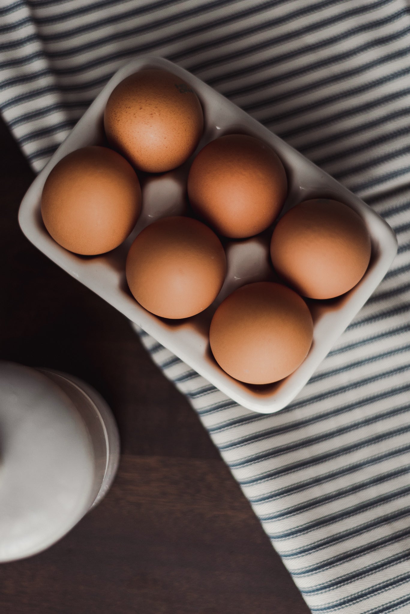his ceramic half dozen egg holder makes cooking eggs instagram worthy and fun.